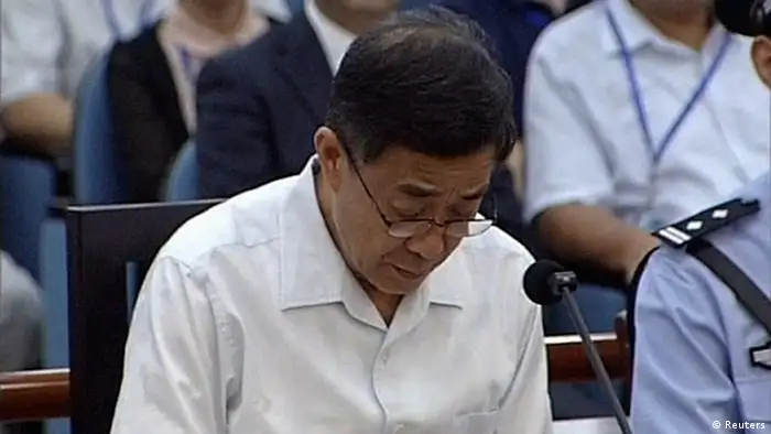 Ousted Chinese politician Bo Xilai sits in court on the third day of his trial in Jinan, Shandong Province, in this still image taken from video shot on August 24, 2013. Bo Xilai accepted responsibility for 5 million yuan ($817,000) in funds he is accused of embezzling which ended up in his wife's bank account, saying he had let his attention wander, in testimony read out in court on Saturday. Bo, once a rising star in China's leadership, is facing charges of corruption, bribery and abuse of power. REUTERS/CCTV via Reuters TV (CHINA - Tags: POLITICS CRIME LAW) ATTENTION EDITORS � THIS IMAGE WAS PROVIDED BY A THIRD PARTY. NO SALES. NO ARCHIVES. FOR EDITORIAL USE ONLY. NOT FOR SALE FOR MARKETING OR ADVERTISING CAMPAIGNS. CHINA OUT. NO COMMERCIAL OR EDITORIAL SALES IN CHINA. THIS PICTURE IS DISTRIBUTED EXACTLY AS RECEIVED BY REUTERS, AS A SERVICE TO CLIENTS