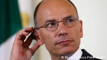 Italy's Prime Minister Enrico Letta listens during a news conference in Vienna August 21, 2013. REUTERS/Heinz-Peter Bader (AUSTRIA - Tags: POLITICS)