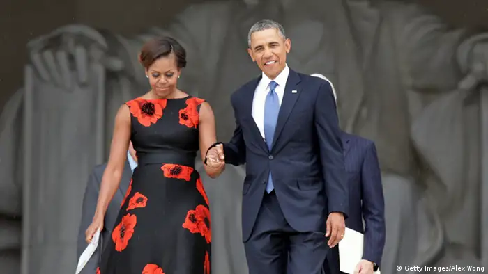 WASHINGTON, DC - AUGUST 28: U.S. President Barack Obama (R) and first lady Michelle Obama arrive at the Let Freedom Ring ceremony at the Lincoln Memorial August 28, 2013 in Washington, DC. The event was to commemorate the 50th anniversary of Dr. Martin Luther King Jr.'s I Have a Dream speech and the March on Washington for Jobs and Freedom. (Photo by Alex Wong/Getty Images)