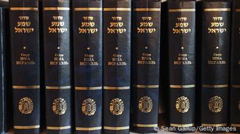OLDENBURG, GERMANY - MARCH 31: Jewish prayer books in Russian and Hebrew line a shelf in the small synagogue on March 31, 2011 in Oldenburg, Germany. Oldenburg is now home to Rabbi Alina Treiger, who is Germany's first female rabbi to be ordained in Germany since World War II. Originally from Ukraine, she completed her rabbinical studies at the Abraham Geiger Kolleg in Potsdam and was ordained in Berlin in 2010. She has since taken up her duties to serve the Jewish communities in Oldenburg and Delmenhorst, which are comprised mostly of Russian-speaking Jews from the former Soviet Union that came to Germany after 1989. (Photo by Sean Gallup/Getty Images)