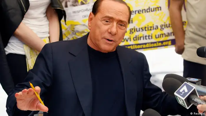 People of Liberty party (PDL) leader Silvio Berlusconi talks with reporters as he signs a referendum on justice reforms and human rights in downtown Rome August 31, 2013. REUTERS/Remo Casilli (ITALY - Tags: POLITICS)