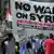 People demonstrate against a US-led strike on Syria in downtown Los Angeles on August 31, 2013. (Photo: JOE KLAMAR/AFP/Getty Images)