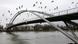 Birds fly next to the Three Countries Bridge Birds fly next to the Three Countries Bridge