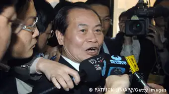 Taiwan's new justice minister, Tseng Yung-fu (C), speaks to reporters after being sworn in at a ceremony in Taipei on March 22, 2010. Tseng replaced Wang Ching-feng, who resigned earlier this month after she attracted a storm of criticism over a vow not to order any executions during her term. Wang's predecessor was also anti-death penalty and Taiwan has not carried out an execution since 2005. AFP PHOTO / PATRICK LIN (Photo credit should read PATRICK LIN/AFP/Getty Images)
