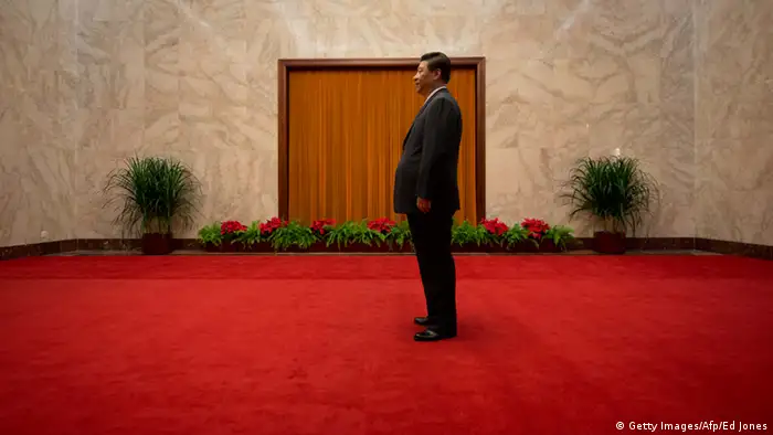 China's President Xi Jinping waits to greet Cuba's First Vice President of the Council of State Miguel Diaz-Canel at the Great Hall of the People on June 18, 2013. Diaz-Canel is on an official visit to China from June 17 to 19. AFP PHOTO / POOL / Ed Jones (Photo credit should read Ed Jones/AFP/Getty Images)