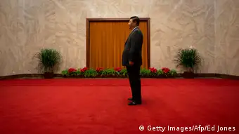China's President Xi Jinping waits to greet Cuba's First Vice President of the Council of State Miguel Diaz-Canel at the Great Hall of the People on June 18, 2013. Diaz-Canel is on an official visit to China from June 17 to 19. AFP PHOTO / POOL / Ed Jones (Photo credit should read Ed Jones/AFP/Getty Images)