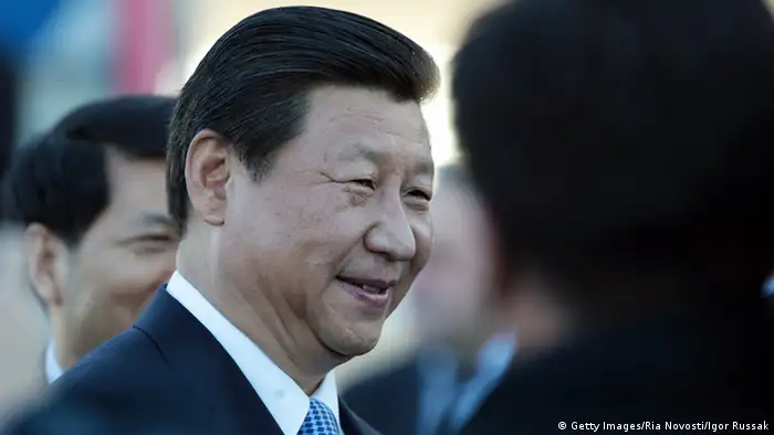SAINT PETERSBURG - SEPTEMBER 04: In this handout image provided by Ria Novosti, President of the People's Republic of China Xi Jinping arrives in Russia ahead of the G20 summit on September 4, 2013 in St. Petersburg, Russia. The G20 summit is scheduled to run between September 5th and 6th. (Photo by Igor Russak/RIA Novosti via Getty Images)