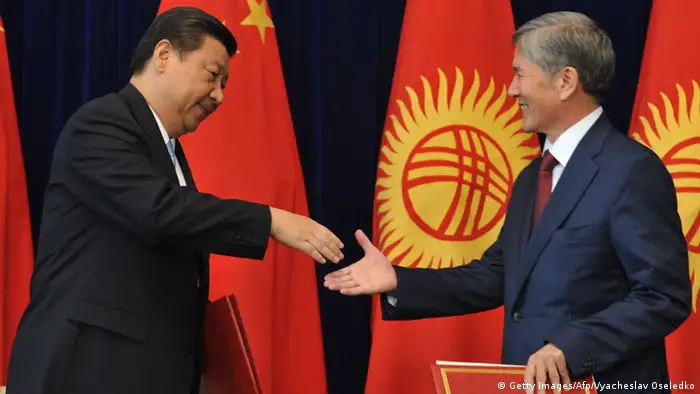 吉尔吉斯斯坦国家主席阿坦巴耶夫会晤到访的中国国家主席习近平同（2013.09.12）