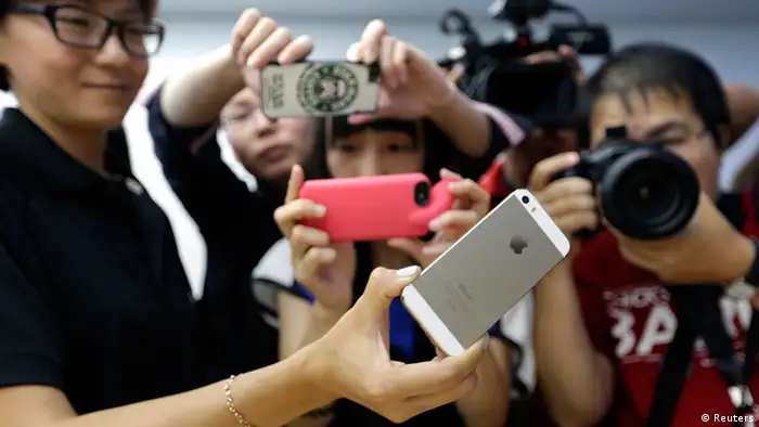 Apple unveils its iPhone 5 in Beijing.