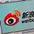 The logo of Sina Corp's Chinese microblog website "Weibo" is seen on a screen in this photo illustration taken in Beijing in this September 13, 2011 file photo. Sina Corp, one of China's biggest Internet firms, runs the microblogging site, which has 500 million registered users. It also employs the censors. The Sina Weibo censors are a small part of the tens of thousands of censors employed in China to control content in traditional media and on the Internet. Picture taken September 13, 2011. REUTERS/Stringer/Files (CHINA - Tags: POLITICS SCIENCE TECHNOLOGY BUSINESS TELECOMS)