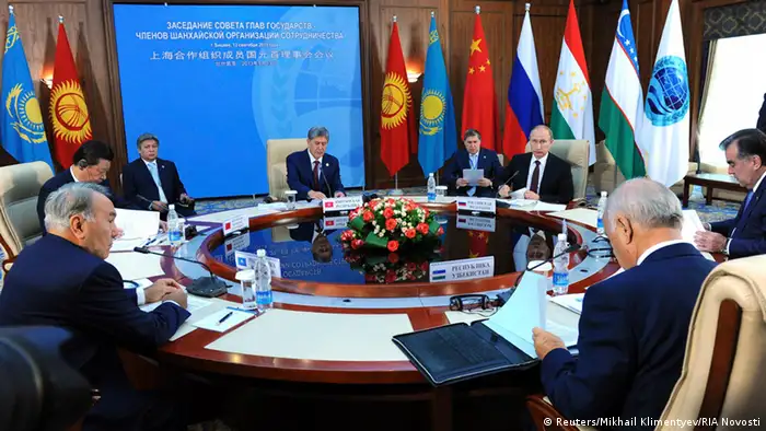 Shanghai Cooperation Organization (SCO) summit leaders and observers attend a session in Bishkek, September 13, 2013. REUTERS/Mikhail Klimentyev/RIA Novosti/Kremlin (KYRGYZSTAN - Tags: POLITICS BUSINESS) ATTENTION EDITORS - THIS IMAGE HAS BEEN SUPPLIED BY A THIRD PARTY. IT IS DISTRIBUTED, EXACTLY AS RECEIVED BY REUTERS, AS A SERVICE TO CLIENTS