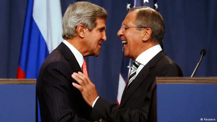 U.S. Secretary of State John Kerry (L) and Russian Foreign Minister Sergei Lavrov (R) shake hands after making statements following meetings regarding Syria, at a news conference in Geneva September 14, 2013. The United States and Russia have agreed on a proposal to eliminate Syria's chemical weapons arsenal, Kerry said on Saturday after nearly three days of talks with Lavrov. REUTERS/Larry Downing (SWITZERLAND - Tags: POLITICS CIVIL UNREST TPX IMAGES OF THE DAY)