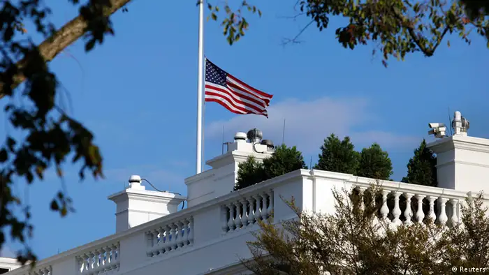 A U.S. flag flies at half staff at the White House September 16, 2013 in remembrance of victims of a shooting in the U.S. Navy Yard in Washington. A 34-year-old gunman opened fire at the Navy Yard in Washington in a shooting that left 13 people dead at the busy military installation not far from the U.S. Capitol and the White House. The suspect was identified by the FBI as Aaron Alexis of Fort Worth, Texas. Washington D.C. police chief Cathy Lanier told reporters that Alexis was engaged in shooting with police officers when he died. REUTERS/Yuri Gripas (UNITED STATES - Tags: POLITICS CRIME LAW)