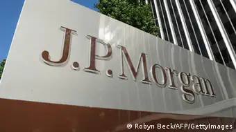 A JPMorgan sign is seen outside the office tower housing the financial services firm's Los Angeles, California offices, August 8, 2013. US banking giant JPMorgan Chase said August 8, 2013 it is facing parallel civil and criminal investigations over its sale of mortgage-backed securities before the financial crisis. JPMorgan disclosed in a securities filing that in May it was notified by the civil division of the US Attorneys Office for the Eastern District of California stating that it had preliminarily concluded that the bank 'violated certain federal securities laws' in connection with the subprime mortgage-backed securities. AFP PHOTO / Robyn Beck (Photo credit should read ROBYN BECK/AFP/Getty Images)