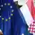 ARCHIV - Die EU-Flagge und die Flagge von Kroatien wehen am 09.12.2011 in Zagreb, Kroatien. Die EU-Kommission stellt am 18.09.2013 die geplanten Sanktionen gegen Kroatien vor. EPA/ANTONIO BAT (zu dpa-Meldung vom 18.09.2013) +++(c) dpa - Bildfunk+++