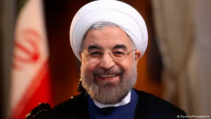 Iranian President Hassan Rouhani smiles during an interview with Ann Curry from the U.S. television network NBC in Tehran, in this picture taken September 18, 2013, and provided by the Iranian Presidency. Rouhani said in the television interview with NBC News on Wednesday that his government would never develop nuclear weapons and that he had complete authority to negotiate a nuclear deal with the West. Reuters/President.ir/Handout via Reuters (IRAN - Tags: POLITICS HEADSHOT) ATTENTION EDITORS � THIS IMAGE WAS PROVIDED BY A THIRD PARTY. NO SALES. NO ARCHIVES. FOR EDITORIAL USE ONLY. NOT FOR SALE FOR MARKETING OR ADVERTISING CAMPAIGNS. THIS PICTURE IS DISTRIBUTED EXACTLY AS RECEIVED BY REUTERS, AS A SERVICE TO CLIENTS