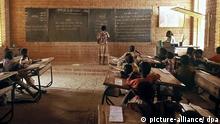 Children sit inside a classroom in an innovative school design in Gando, Burkina Faso. The Primary School won the 2004 Aga Khan Award for Architecture on 28 November 2004 for projects that have attained the highest international standards of architectural excellence while reflecting the values of the primarily Muslim societies the projects are intended to serve. The primary school goes far beyond its educational programme and exemplifies highest-calibre architectural design employing locally available materials and techniques, training and community participation and empowerment. EPA/SIMEON DUCHOUD-THE AGA KHAN AWARD +++(c) dpa - Report+++
