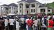 epa03875706 Nigerians look on at the scene of a building under construction following clashes between alleged Boko Haram militants and Nigerian security forces in the capital Abuja, Nigeria 20 September 2013. At least eight people were feared dead after Islamist sect Boko Haram attacked security agents in Nigeria_s capital Abuja, an official said. Boko Haram gunmen assaulted security personnel in the Apo neighbourhood of Abuja where many lawmakers reside. Boko Haram, which means 'Western education is sinful,' has been active in the Muslim north of the West African country, carrying out attacks aimed primarily at Christians. EPA/Deji Yake +++(c) dpa - Bildfunk+++ epa03875706 Nigerians look on at the scene of a building under construction following clashes between alleged Boko Haram militants and Nigerian security forces in the capital Abuja, Nigeria 20 September 2013. At least eight people were feared dead after Islamist sect Boko Haram attacked security agents in Nigeria_s capital Abuja, an official said. Boko Haram gunmen assaulted security personnel in the Apo neighbourhood of Abuja where many lawmakers reside. Boko Haram, which means 'Western education is sinful,' has been active in the Muslim north of the West African country, carrying out attacks aimed primarily at Christians. EPA/Deji Yake +++(c) dpa - Bildfunk+++
