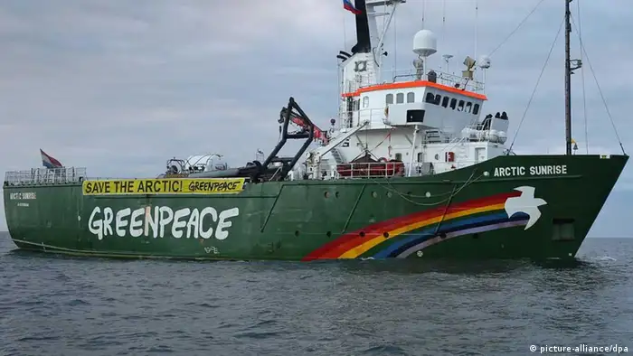 ITAR-TASS: RUSSIA. SEPTEMBER 20, 2013. The Greenpeace ship Arctic Sunrise approaches the Prirazlomnaya offshore oil platform in the Pechora Sea to stage an action against oil drilling in the Arctic. (Photo ITAR-TASS/ Greenpeace press service)