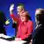 German Chancellor and conservative Christian Democratic Union (CDU) leader Angela Merkel (C) waves during a CDU election campaign rally in Berlin September 21, 2013. Merkel looks on track to win a third term in a weekend election in Germany but faced a battle to preserve her centre-right majority and avert a potentially divisive coalition with the centre-left.. REUTERS/Thomas Peter (GERMANY - Tags: POLITICS ELECTIONS) ***FREI FÜR SOCIAL MEDIA***