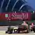 Red Bull driver Sebastian Vettel of Germany drives into the pitlane during the third practice session of the Formula One Singapore Grand Prix (Photo: MANAN VATSYAYANA/AFP/Getty Images)