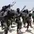 al-Shabab fighters perform military exercises Photo:Farah Abdi(AP)