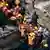 ATTENTION EDITORS - VISUAL COVERAGE OF SCENES OF INJURY OR DEATH Rescue workers recover a body from the debris at the site of a collapsed residential building in Mumbai September 27, 2013. One person was killed and six injured when the five-storey building came crashing down in south Mumbai on Friday morning, local media quoted officials as saying. REUTERS/Danish Siddiqui (INDIA - Tags: DISASTER) TEMPLATE OUT