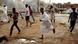 In this Friday, Sept. 27, 2013 photo, Sudanese protesters run from riot police during clashes in Khartoum, Sudan. The regime of President Omar al-Bashir is trying to stop public anger over fuel price hikes from turning into an Arab Spring-style uprising against his 24-year rule. (AP Photo/Abd Raouf) In this Friday, Sept. 27, 2013 photo, Sudanese protesters run from riot police during clashes in Khartoum, Sudan. The regime of President Omar al-Bashir is trying to stop public anger over fuel price hikes from turning into an Arab Spring-style uprising against his 24-year rule. (AP Photo/Abd Raouf)