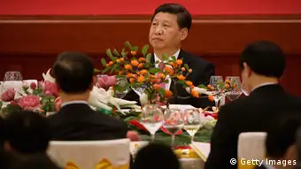 BEIJING, CHINA - SEPTEMBER 30: Chinese President Xi Jinping (Top) attends a reception marking the 64th anniversary of the founding of the People's Republic of China at the Great Hall of the People on September 30, 2013 in Beijing, China. On October 1, 1949, Chinese leader Mao Zedong stood at the Tiananmen Rostrum to declare the founding of the People's Republic of China. (Photo by Feng Li/Getty Images)
