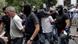 Members of the far-right Golden Dawn party are escorted by anti-terrorism police officers to the court, where they will respond to the charges of belonging to a criminal organization (Photo: REUTERS/John Kolesidis) Members of the far-right Golden Dawn party are escorted by anti-terrorism police officers to the court, where they will respond to the charges of belonging to a criminal organization (Photo: REUTERS/John Kolesidis)