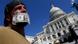 John Zangas, who identified himself as a federal employee, protests against the current government shutdown at the U.S. Capitol in Washington, October 2, 2013. REUTERS/Jonathan Ernst (UNITED STATES - Tags: POLITICS CIVIL UNREST BUSINESS EMPLOYMENT TPX IMAGES OF THE DAY) John Zangas, who identified himself as a federal employee, protests against the current government shutdown at the U.S. Capitol in Washington, October 2, 2013. REUTERS/Jonathan Ernst (UNITED STATES - Tags: POLITICS CIVIL UNREST BUSINESS EMPLOYMENT TPX IMAGES OF THE DAY)
