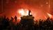 A riot police officer, on a armoured personnel carrier surrounded by anti-Mursi protesters (foreground), fires rubber bullets at members of the Muslim Brotherhood and supporters of ousted Egyptian President Mohamed Mursi along a road at Ramsis square, which leads to Tahrir Square, during clashes at a celebration marking Egypt's 1973 war with Israel, in Cairo October 6, 2013. At least 28 people were killed and more than 90 wounded in clashes during protests in Egypt on Sunday, security sources and state media said, as the crisis since the army seized power three months ago showed no sign of abating. REUTERS/Amr Abdallah Dalsh (EGYPT - Tags: POLITICS CIVIL UNREST) A riot police officer, on a armoured personnel carrier surrounded by anti-Mursi protesters (foreground), fires rubber bullets at members of the Muslim Brotherhood and supporters of ousted Egyptian President Mohamed Mursi along a road at Ramsis square, which leads to Tahrir Square, during clashes at a celebration marking Egypt's 1973 war with Israel, in Cairo October 6, 2013. At least 28 people were killed and more than 90 wounded in clashes during protests in Egypt on Sunday, security sources and state media said, as the crisis since the army seized power three months ago showed no sign of abating. REUTERS/Amr Abdallah Dalsh (EGYPT - Tags: POLITICS CIVIL UNREST)