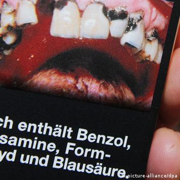 Rotting teeth on cigarette packs