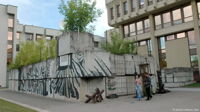 A monument to the victims of independence stands next to the parliament building in Vilnius