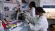 Ms Betouke Ongwe working in the lab (Albert Schweitzer Clinic, Gabon) with one of her fellow researchers. (Photo: Gaia Manco) Ms Betouke Ongwe working in the lab (Albert Schweitzer Clinic, Gabon) with one of her fellow researchers. (Photo: Gaia Manco)