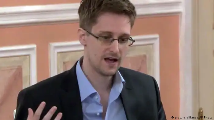 In this image made from video released by WikiLeaks on Friday, Oct. 11, 2013, former National Security Agency systems analyst Edward Snowden speaks during a presentation ceremony for the Sam Adams Award in Moscow, Russia. Snowden was awarded the Sam Adams Award, according to videos released by the organization WikiLeaks. The award ceremony was attended by three previous recipients. (AP Photo)