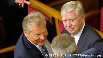 EU envoys, former Polish President Aleksander Kwasniewski (L) and former European Parliament President Pat Cox SERGEI SUPINSKY/AFP/Getty Images