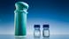 Becherglas mit CO2-haltigem Polyurethan-Schaumstoff, daneben Flaschen mit den beiden Vorprodukten für das Material: CO2-basiertem Polyol und konventionellem Isocyanat. (Foto: Bayer Material Science) Becherglas mit CO2-haltigem Polyurethan-Schaumstoff, daneben Flaschen mit den beiden Vorprodukten für das Material: CO2-basiertem Polyol und konventionellem Isocyanat. (Foto: Bayer Material Science)