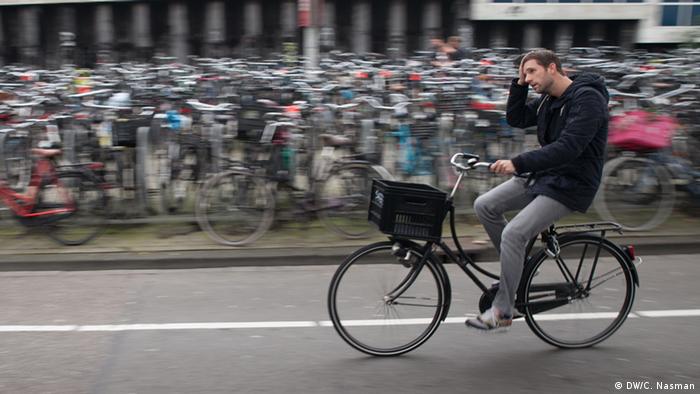 A man on a bike in Amsterdam (photo: Carl Nasman)