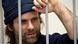 In this photo released by Greenpeace International one of the activists Iain Rogers from the United Kingdom is in a defendants' cage at a Murmansk district court, in Murmansk, Russia, Tuesday, Oct. 22, 2013. AP Photo/Greenpeace International, Dmitri Sharomov In this photo released by Greenpeace International one of the activists Iain Rogers from the United Kingdom is in a defendants' cage at a Murmansk district court, in Murmansk, Russia, Tuesday, Oct. 22, 2013. AP Photo/Greenpeace International, Dmitri Sharomov