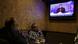 Egyptians watch the weekly program of Bassem Youssef, the man known as ¿Egypt¿s Jon Stewart,¿ at a coffee shop in Cairo, Egypt, Friday, Oct. 25, 2013. Egypt¿s most popular TV satirist, famed for mercilessly skewering the former Islamist president on his weekly program, dove headfirst back into stormy politics Friday after four months off the air amid the turmoil surrounding the country¿s coup. His new target for mockery: the over-the-top pro-military fervor sweeping Egyptians. Youssef returned to the air in a radically different nation, where satirizing the leadership is a far trickier task. (AP Photo/Khalil Hamra) Egyptians watch the weekly program of Bassem Youssef, the man known as ¿Egypt¿s Jon Stewart,¿ at a coffee shop in Cairo, Egypt, Friday, Oct. 25, 2013. Egypt¿s most popular TV satirist, famed for mercilessly skewering the former Islamist president on his weekly program, dove headfirst back into stormy politics Friday after four months off the air amid the turmoil surrounding the country¿s coup. His new target for mockery: the over-the-top pro-military fervor sweeping Egyptians. Youssef returned to the air in a radically different nation, where satirizing the leadership is a far trickier task. (AP Photo/Khalil Hamra)