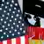 ILLUSTRATION - US flag, iPhone, with German Bundesadler eagle Photo: Arno Burgi/dpa