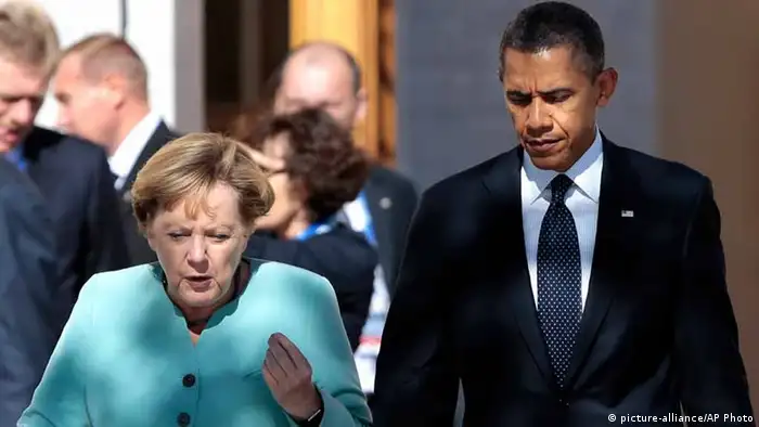 FILE - In this Sept. 6, 2013, file photo, President Barack Obama, right, walks with Germany's Chancellor Angela Merkel prior to a group photo of G-20 leaders outside of the Konstantin Palace in St. Petersburg, Russia. Reports based on leaks from former NSA systems analyst Edward Snowden suggest the U.S. has monitored the telephone communications of 35 foreign leaders. The fact that Merkel was among them has been particularly troubling to many in Europe and on Capitol Hill, given her status as a senior stateswoman, the leader of Europe¿s strongest economy, and a key American ally on global economics, Iranian nuclear negotiations and the Afghanistan war. (AP Photo/Ivan Sekretarev, File)