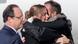 Former French hostage Daniel Larribe (R) is welcomed by relatives next to French President Francois Hollande (L) on the tarmac upon their arrival at Villacoublay military airport, near Paris, October 30, 2013. Four Frenchmen Pierre Legrand, Daniel Larribe, Thierry Dol and Marc Feret held hostage in the Sahara desert by al Qaeda-linked gunmen for three years left Niger on a French government plane on Wednesday morning. The men, who were kidnapped in 2010 while working for French nuclear group Areva and a subsidiary of construction group Vinci in northern Niger, were freed on Tuesday after secret talks. REUTERS/Jacky Naegelen (FRANCE - Tags: POLITICS TPX IMAGES OF THE DAY) Former French hostage Daniel Larribe (R) is welcomed by relatives next to French President Francois Hollande (L) on the tarmac upon their arrival at Villacoublay military airport, near Paris, October 30, 2013. Four Frenchmen Pierre Legrand, Daniel Larribe, Thierry Dol and Marc Feret held hostage in the Sahara desert by al Qaeda-linked gunmen for three years left Niger on a French government plane on Wednesday morning. The men, who were kidnapped in 2010 while working for French nuclear group Areva and a subsidiary of construction group Vinci in northern Niger, were freed on Tuesday after secret talks. REUTERS/Jacky Naegelen (FRANCE - Tags: POLITICS TPX IMAGES OF THE DAY)