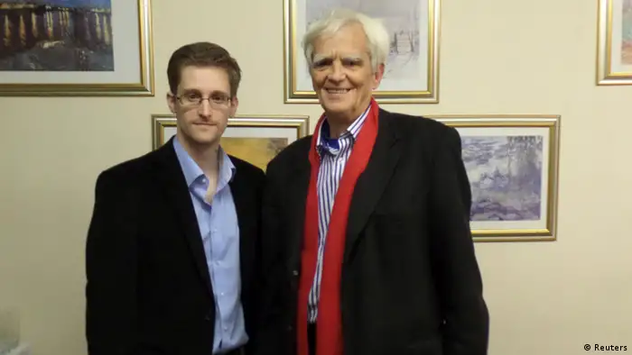 German Greens lawmaker Hans-Christian Stroebele poses for a picture with fugitive former U.S. spy agency contractor Edward Snowden (L) in an undisclosed location in Moscow, October 31, 2013. Stroebele met Snowden in Moscow on Thursday, Stroebele's office said in a statement, and would give details of the meeting on Friday. Snowden passed on an envelope with a letter addressed to the German government, Germany's lower house of parliament, the Bundestag, and to the Federal Public Prosecutor (Generalbundesanwalt). The letter is to be disclosed during a news conference on Friday in Berlin. REUTERS/Handout (RUSSIA - Tags: POLITICS TPX IMAGES OF THE DAY) ATTENTION EDITORS � THIS IMAGE WAS PROVIDED BY A THIRD PARTY. NO SALES. NO ARCHIVES. FOR EDITORIAL USE ONLY. NOT FOR SALE FOR MARKETING OR ADVERTISING CAMPAIGNS. THIS PICTURE IS DISTRIBUTED EXACTLY AS RECEIVED BY REUTERS, AS A SERVICE TO CLIENTS