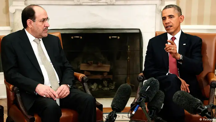 U.S. President Barack Obama (R) and Iraq's Prime Minister Nuri al-Maliki (L) talk to reporters in the Oval Office after meeting at the White House in Washington, November 1, 2013. REUTERS/Jonathan Ernst (UNITED STATES - Tags: POLITICS)