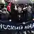 Колонна участников акции с растяжкой "Русский марш"