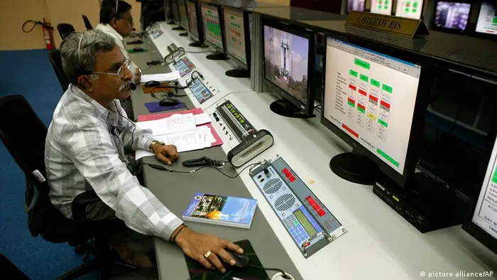 A technician monitors the functions of the Polar Satellite Launch Vehicle (PSLV-C25) at the Satish Dhawan Space Center at Sriharikota, in the southern Indian state of Andhra Pradesh, Wednesday, Oct. 30, 2013. (AP Photo/Arun Sankar K)