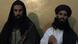 This video grab taken on November 7, 2013, shows Asmatullah Shaheen (R) caretaker chief Tehreek-e-Taliban Pakistan (TTP) announcing the new leader of TTP during a press conference in an undisclosed location in northwest Pakistan. The Pakistani Taliban appointed a hardline cleric linked to the attack on Malala Yousafzai as their new chief on November 7, throwing proposed peace talks with the government into serious doubt. Maulana Fazlullah, elected by the Taliban's supreme council, led the militants' brutal two-year rule in Pakistan's northwest valley of Swat in 2007-2009, before a military operation retook the area. AFP PHOTO/THIR KHAN (Photo credit should read THIR KHAN/AFP/Getty Images) This video grab taken on November 7, 2013, shows Asmatullah Shaheen (R) caretaker chief Tehreek-e-Taliban Pakistan (TTP) announcing the new leader of TTP during a press conference in an undisclosed location in northwest Pakistan. The Pakistani Taliban appointed a hardline cleric linked to the attack on Malala Yousafzai as their new chief on November 7, throwing proposed peace talks with the government into serious doubt. Maulana Fazlullah, elected by the Taliban's supreme council, led the militants' brutal two-year rule in Pakistan's northwest valley of Swat in 2007-2009, before a military operation retook the area. AFP PHOTO/THIR KHAN (Photo credit should read THIR KHAN/AFP/Getty Images)