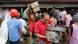 Filipinos carrying grocery items walk out of a store that was forced open in the super typhoon devastated city of Tacloban, Leyte province, Philippines, 10 November 2013. (Photo: EPA) Filipinos carrying grocery items walk out of a store that was forced open in the super typhoon devastated city of Tacloban, Leyte province, Philippines, 10 November 2013. (Photo: EPA)
